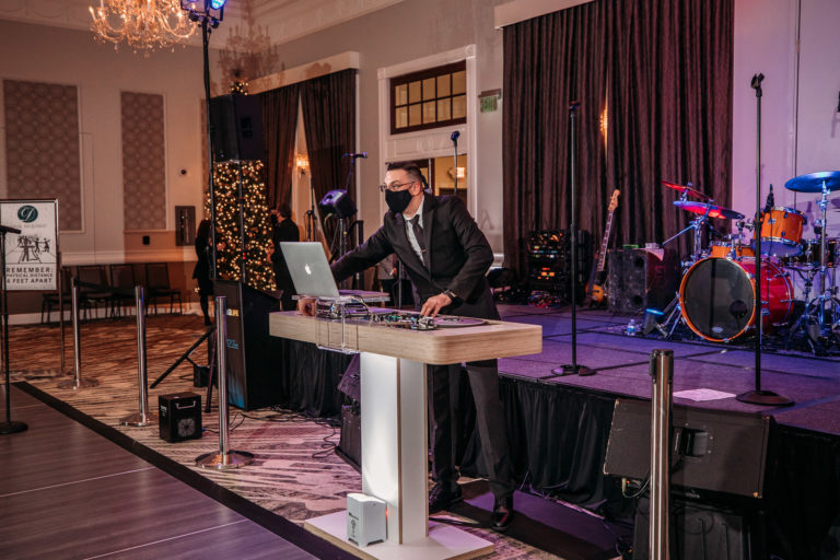 DJ playing at a wedding during COVID