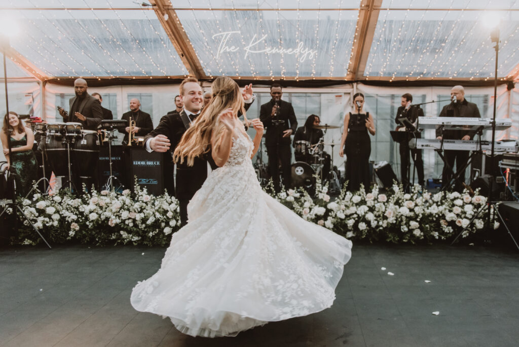 Experience performs Philadelphia Rooftop Wedding with dancing bride and groom- photography by M2 Photo