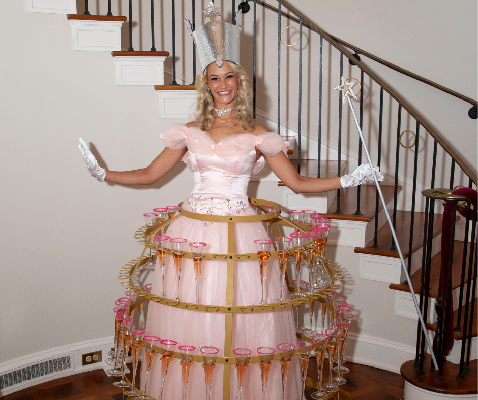 Glinda the Good With Champagne Skirt Greeter